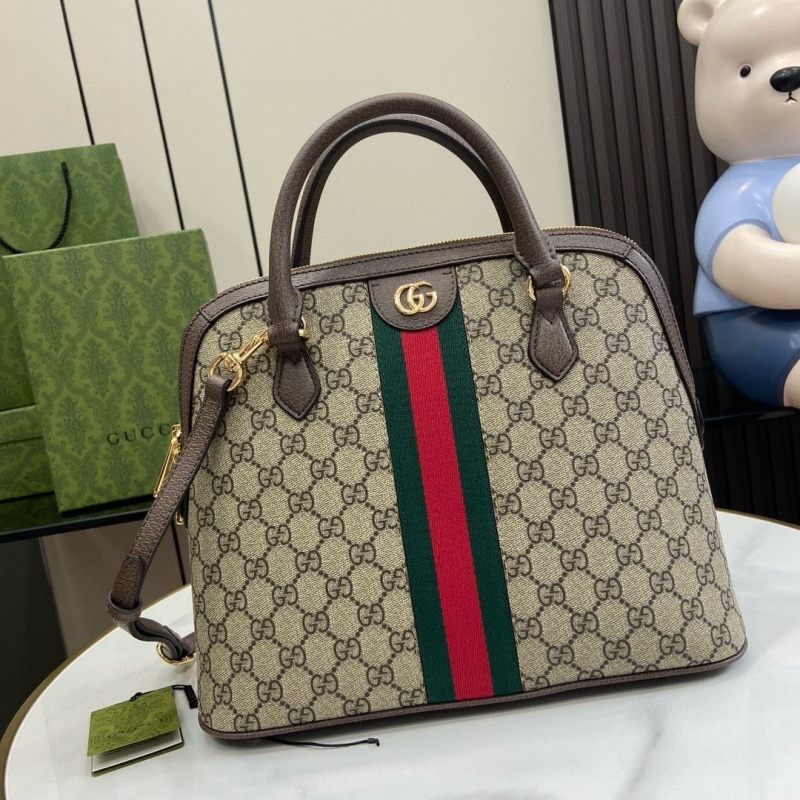 G*u*i top handle bags